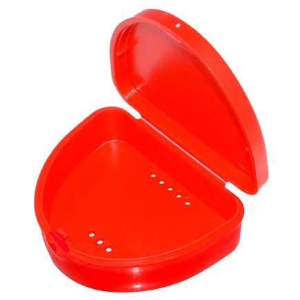Compact red retainer and aligner box with hinged lid, air holes, and smooth gloss finish for hygienic storage.