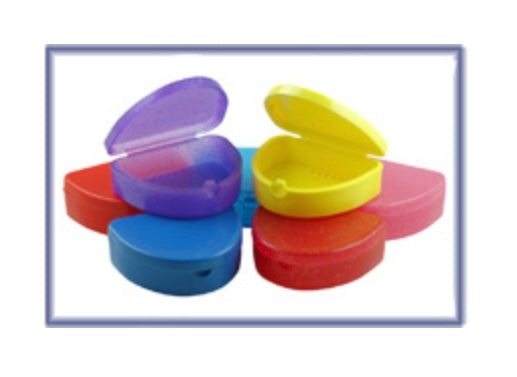Colorful compact retainer boxes with hinged lids and air holes for hygiene storage of retainers and mouthguards