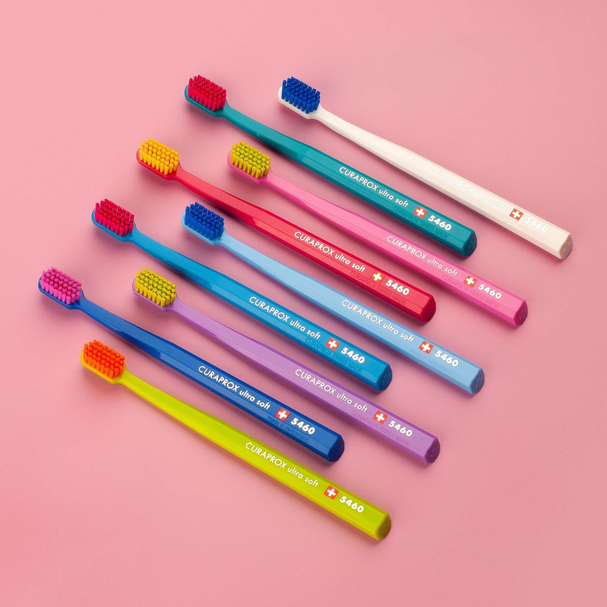 Curaprox CS 5460 ultra soft toothbrushes in assorted colors with dense Curen® filaments for gentle and effective cleaning.