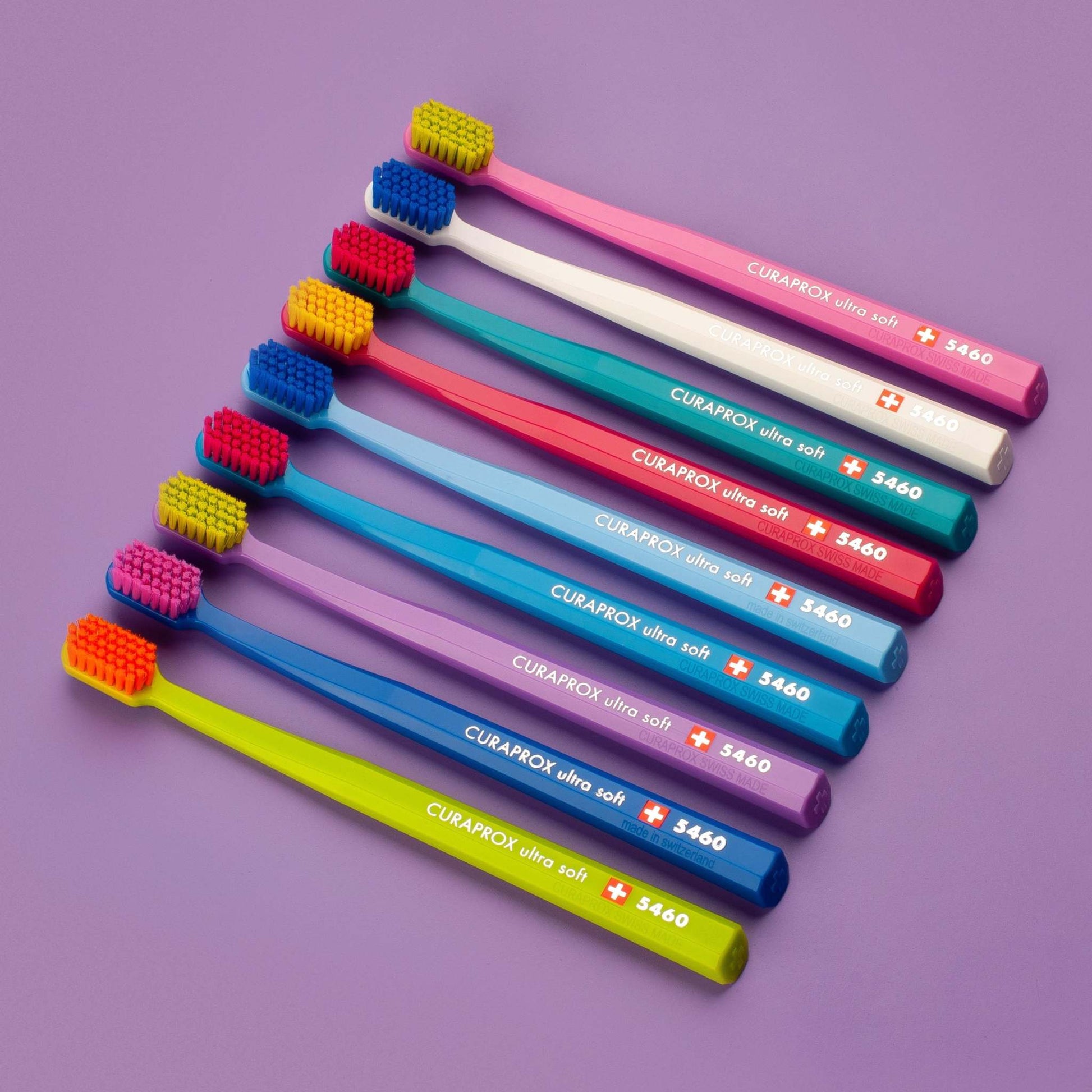 Curaprox CS 5460 ultra soft toothbrushes in assorted colors with dense, gentle Curen® bristles for effective plaque removal and gum care