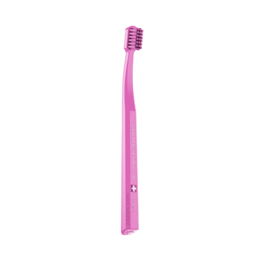 Curaprox CS smart ultra soft pink toothbrush with compact head and octagonal handle for gentle, precise cleaning